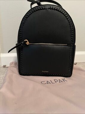 Calpak Black Mini Backpack with Whipstitch Detailing and Gold Hardware